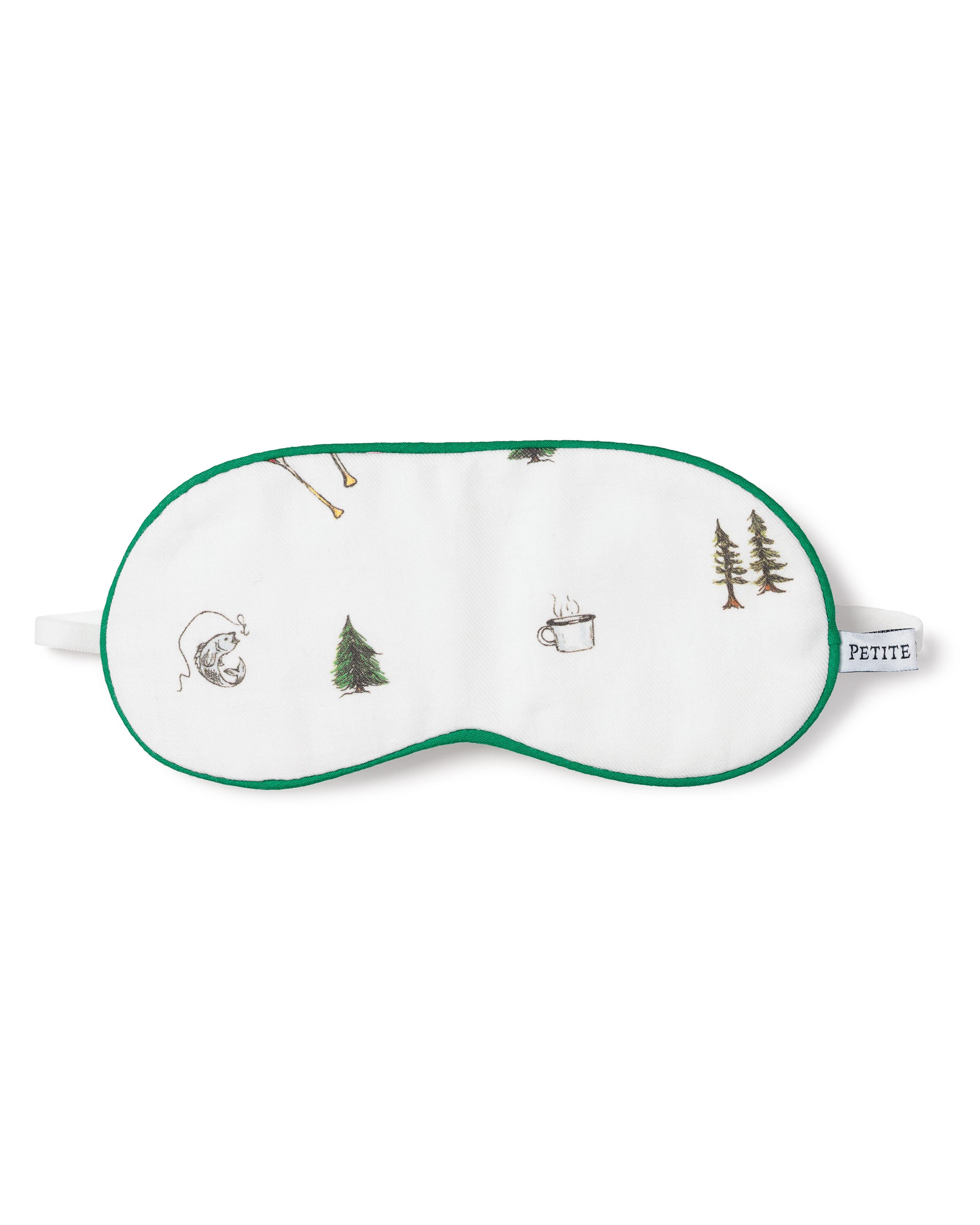 The Kids Sleep Mask in The Great Outdoors by Petite Plume features a white design with green trim, adorned with camping scenes like trees, a globe, a mug, and ski gear. PETITE is artfully displayed on the side strap—ideal for young adventurers who dream of the outdoors.