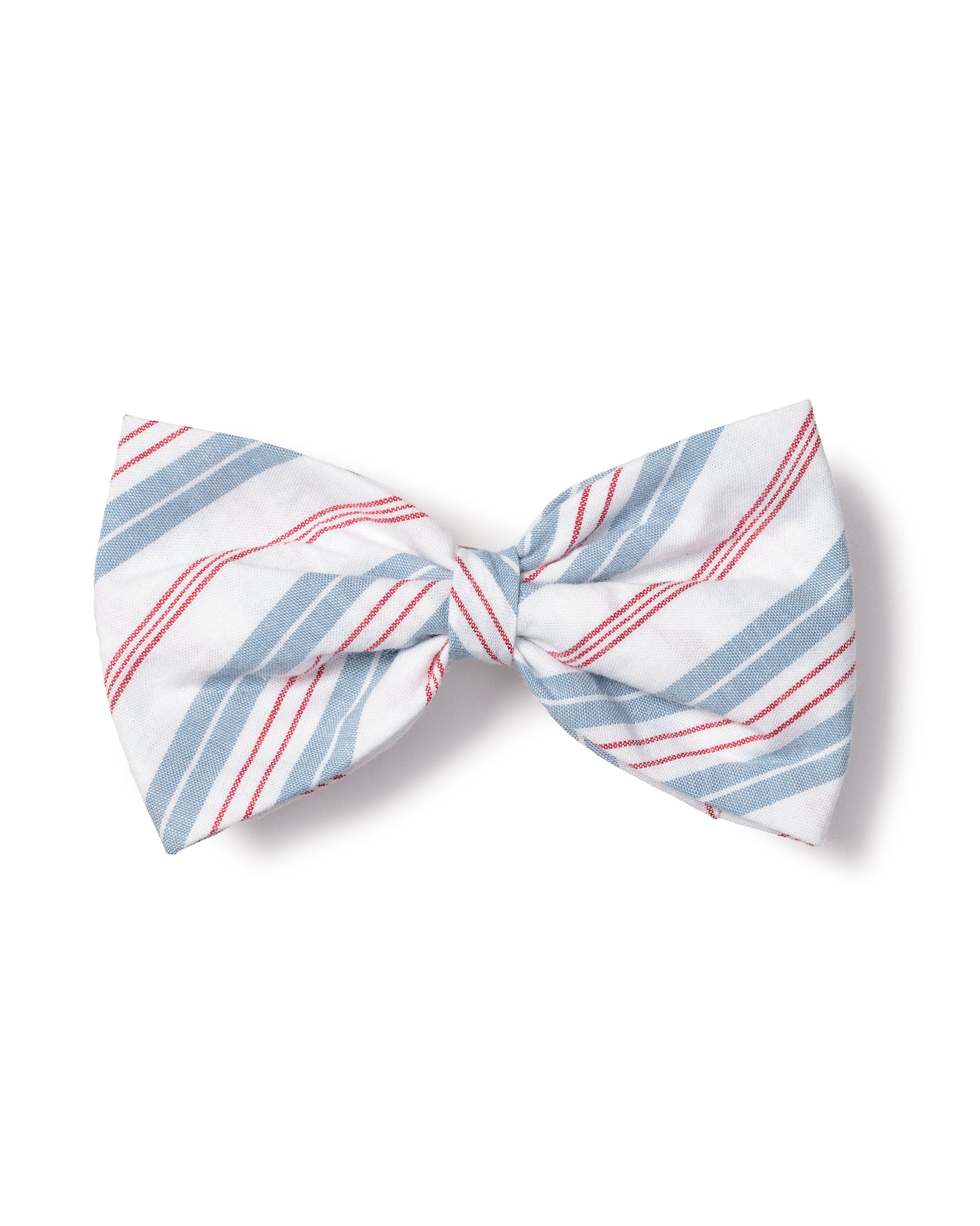 The Petite Plume Dog Vintage French Stripes Bowtie features a charming design with blue, red, and white diagonal stripes and a central knot against a white background.