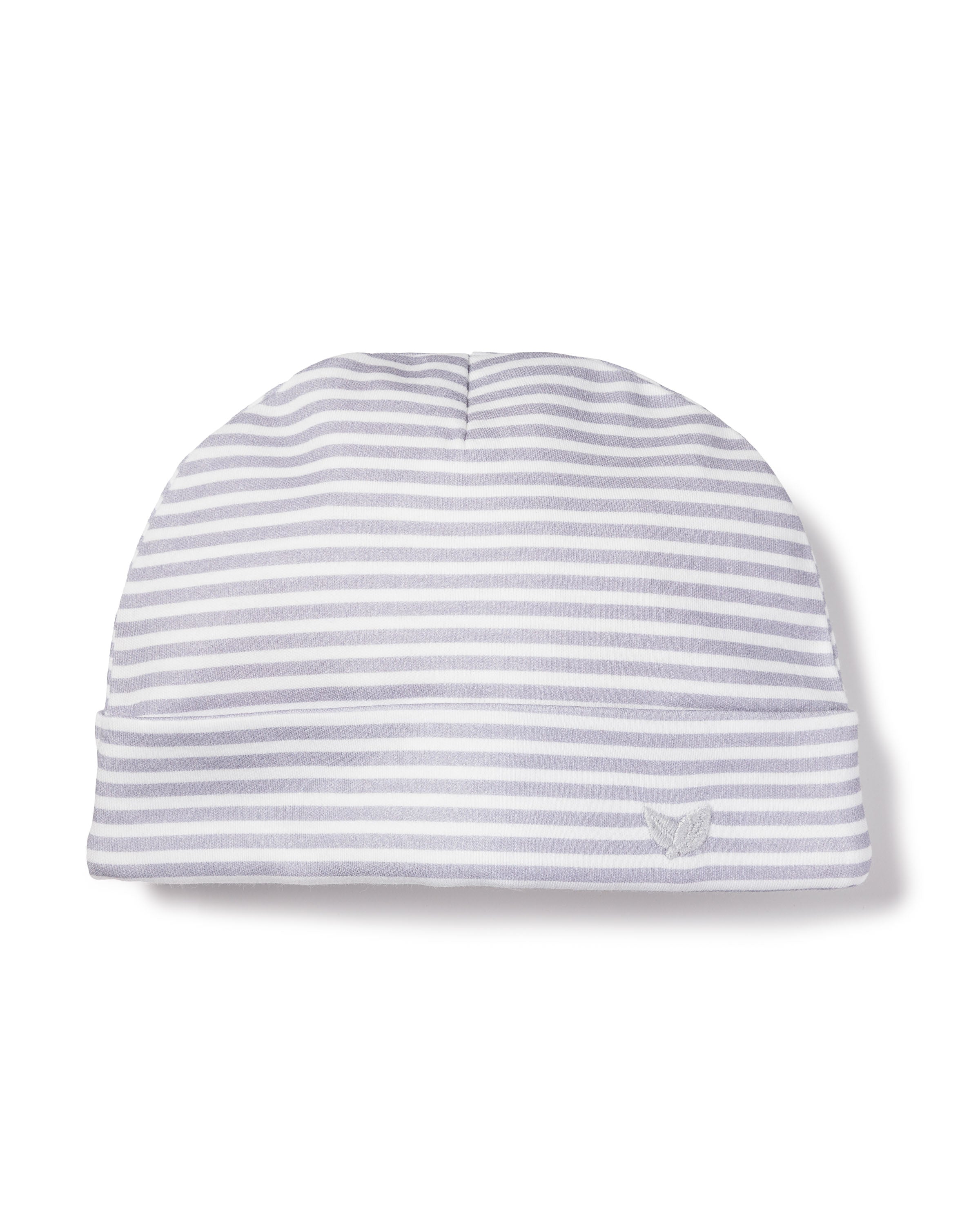 The Petite Plume Babys Pima Hat in Grey Stripes is crafted from luxurious Peruvian Pima Cotton, featuring soft gray stripes on white, with a folded edge displaying an embroidered whale tail logo. Ideal for delicate skin, its presented laid flat on a white surface.