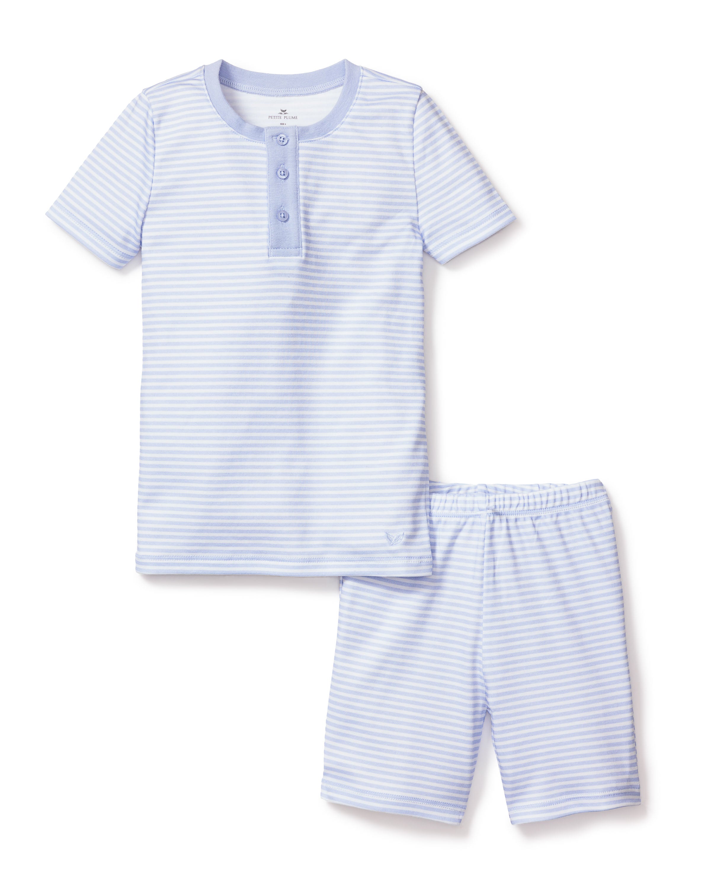 The Kids Pima Snug Fit Pajama Short Set in Blue Stripes by Petite Plume offers a comfy duo with soft Pima cotton. The light blue and white striped top has a three-button placket, while the shorts include an elastic waistband, ensuring coordinated style for a restful sleep.