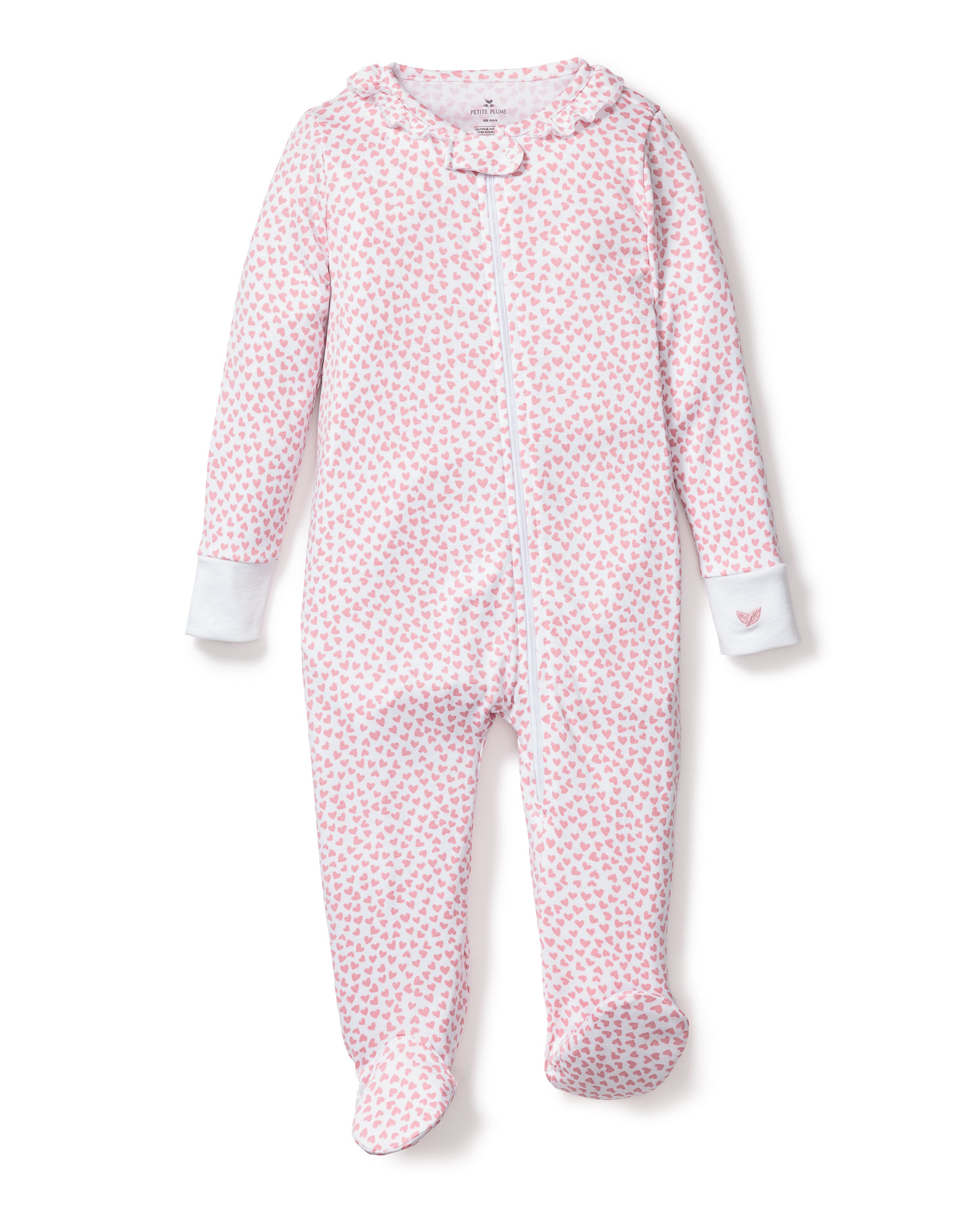 The Petite Plume Babys Pima Ruffle Collar Romper in Sweethearts is a pink and white snug-fit onesie with zipper front, small heart pattern, and white cuffs and feet. Made from soft Pima cotton, it includes a hood for added warmth and comfort.