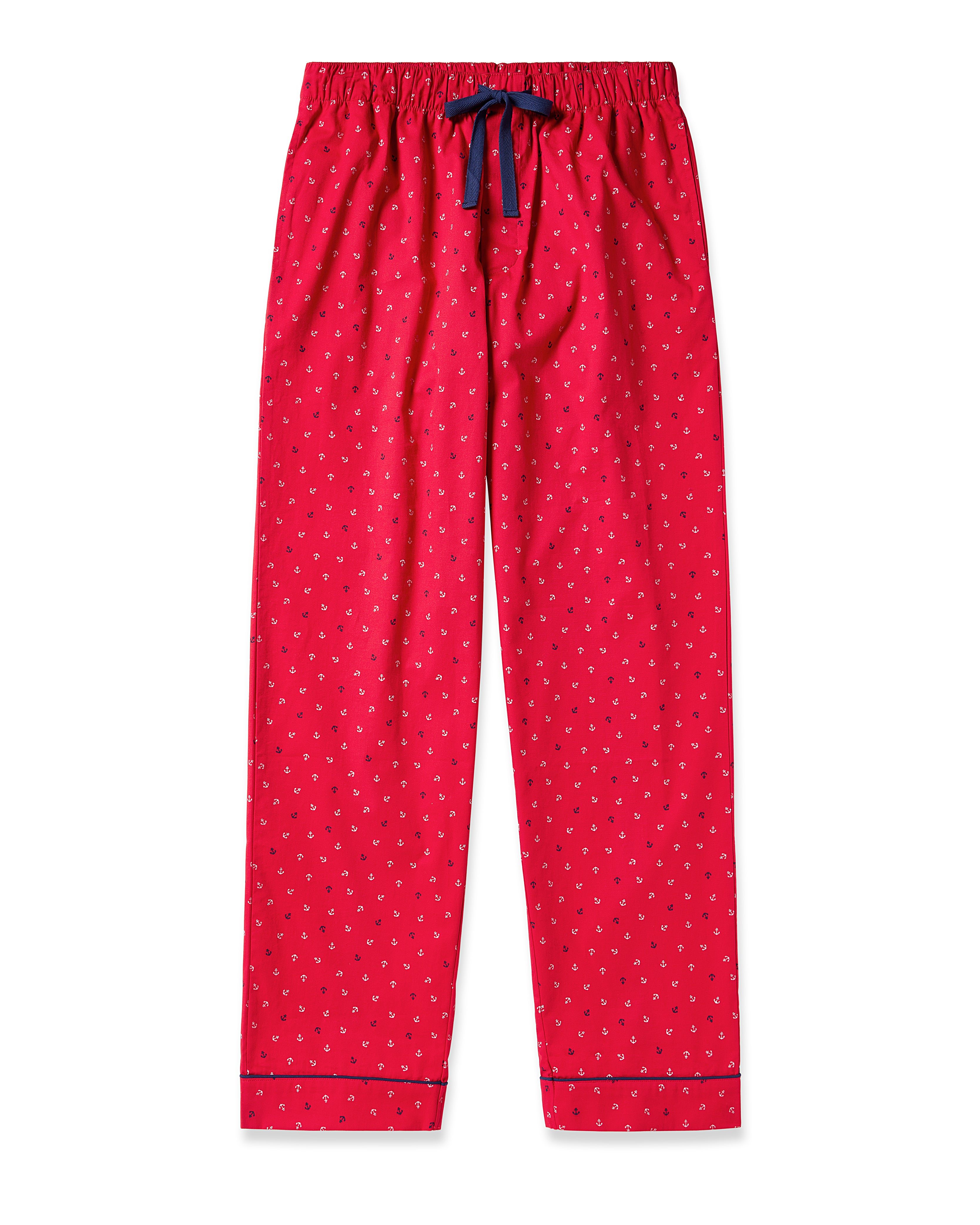 The Mens Twill Pajama Pant in Anchors Away by Petite Plume is made from premium cotton with a small white dotted pattern. It features a navy blue drawstring at the waist and navy piping at the cuffs, blending comfort with style.