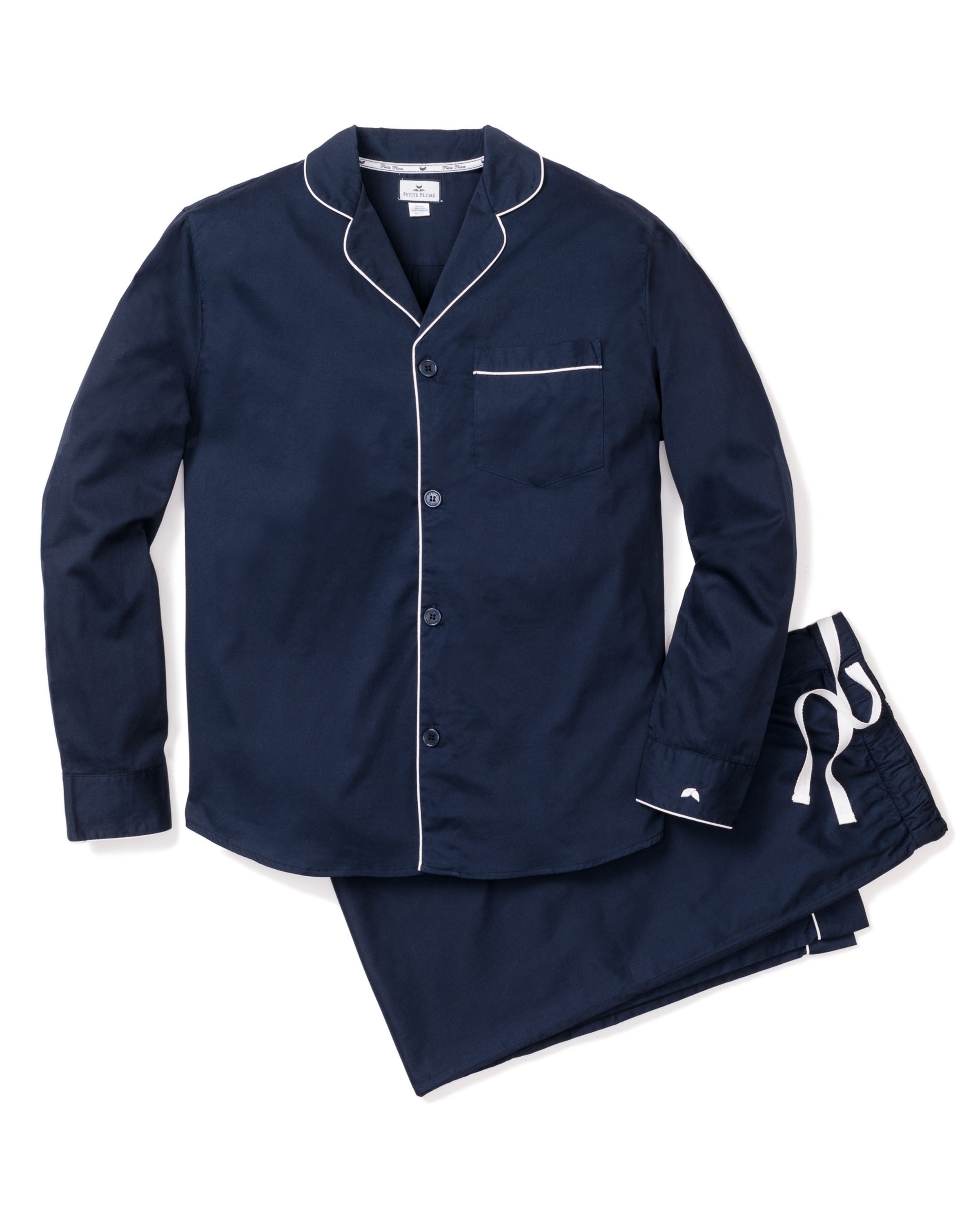 The Mens Flannel Pajama Set in Navy by Petite Plume features a long-sleeve button-up shirt with a chest pocket and drawstring pants, crafted from 100% cotton twill with white trim, displayed on a white background.