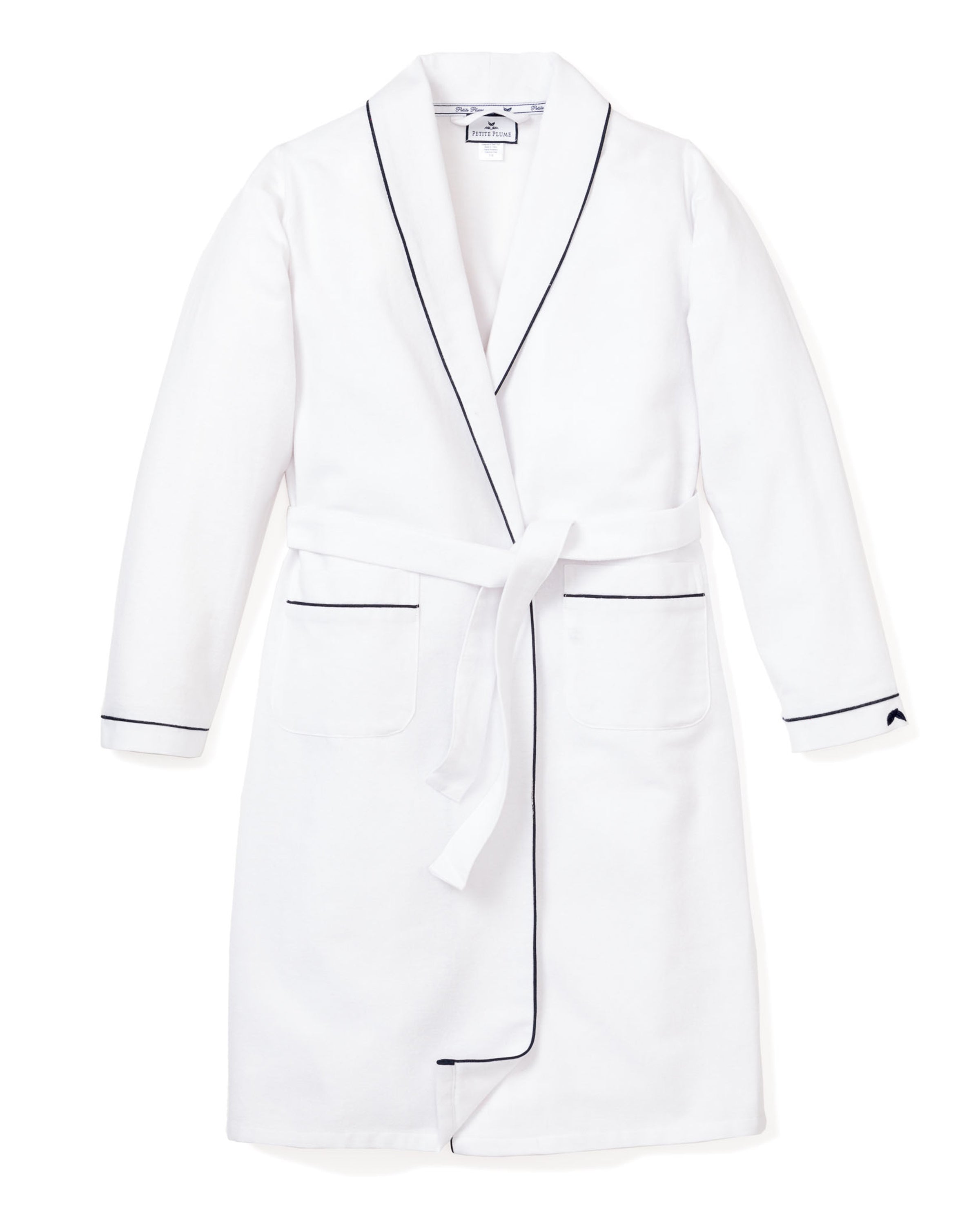 The Mens Flannel Robe by Petite Plume, in white with navy piping, features long sleeves, a waist tie, and two front pockets. Its classic design is perfect for those who value timeless style in cotton sleepwear.