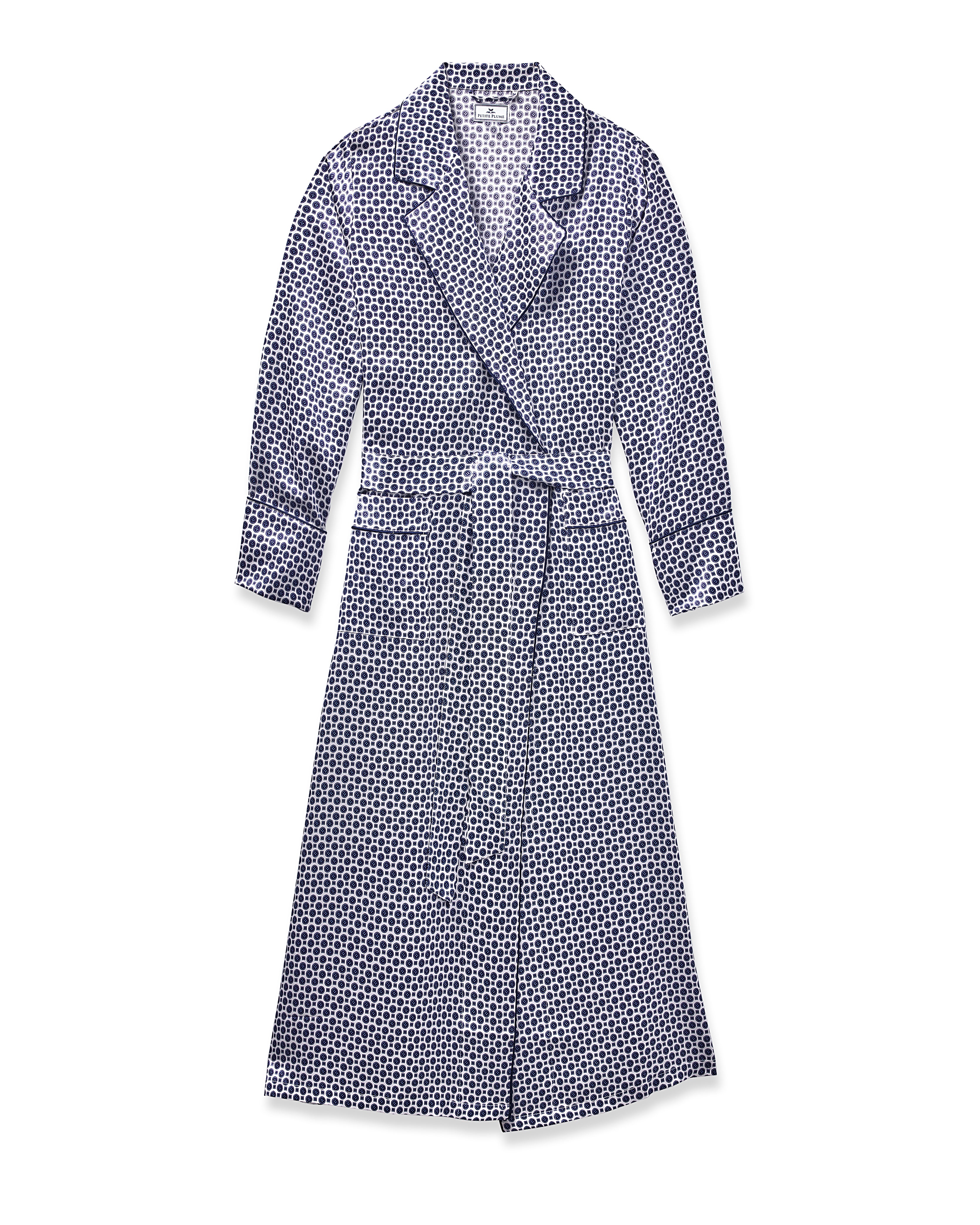 The Petite Plume Womens Silk Robe in Navy Foulard is an ankle-length, long-sleeved sleepwear piece with a geometric print, notched collar, two front pockets, and a matching belt. It offers a smooth silk appearance.