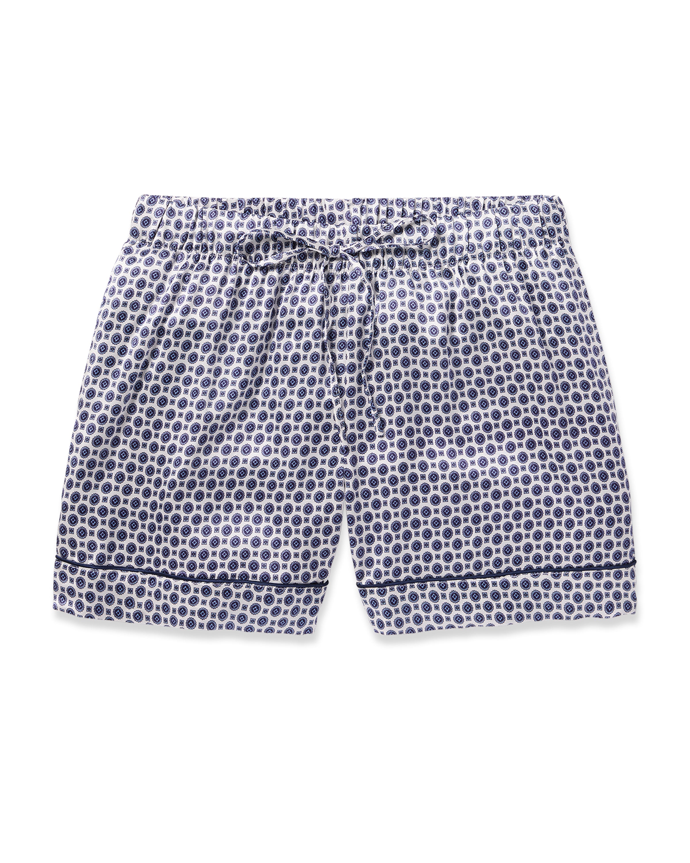 Petite Plumes Womens Silk Shorts in Navy Foulard feature a bow-tie detail and elastic waistband, perfect for luxury sleepwear. They boast a lightweight, breathable fabric with a refined geometric pattern.