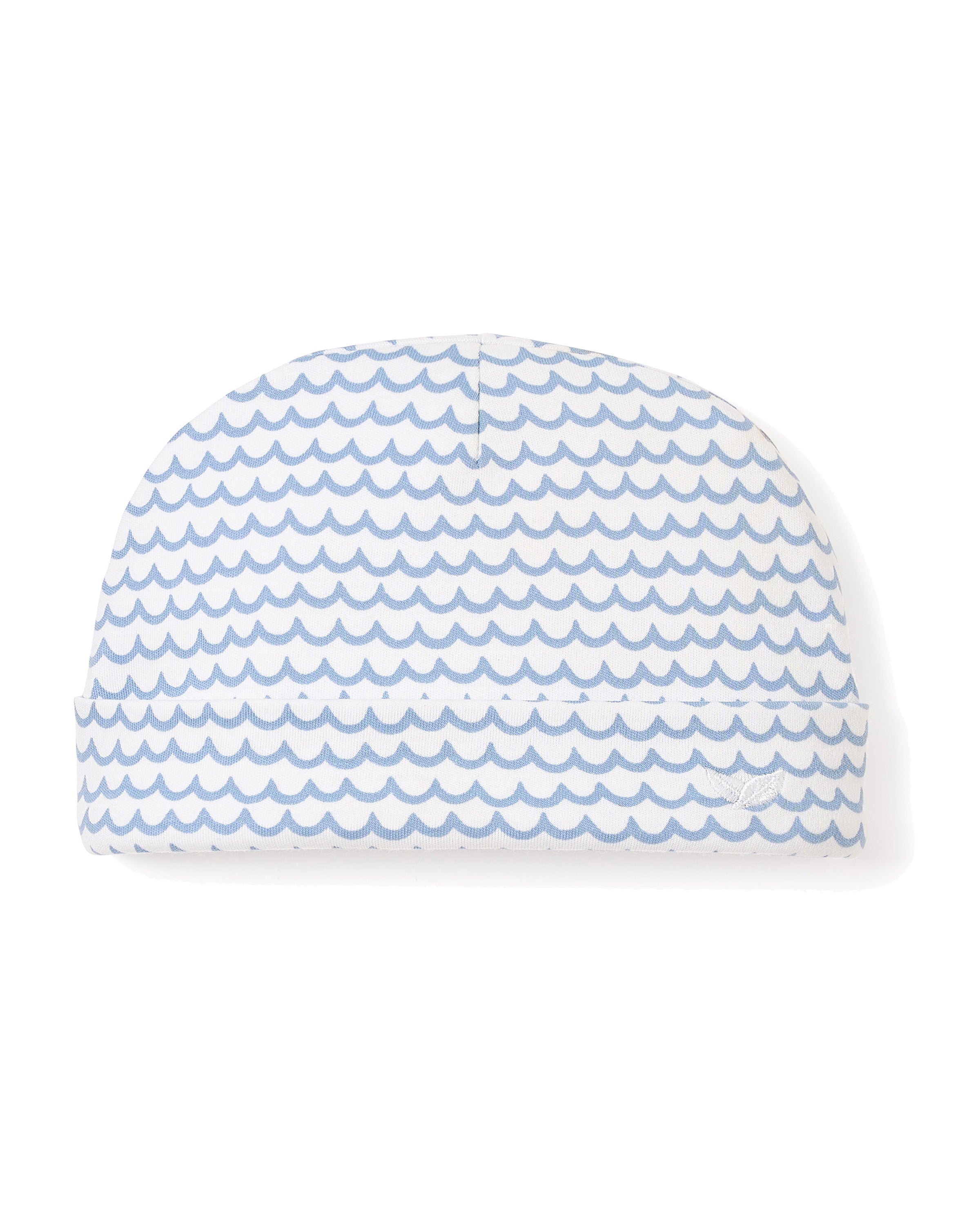 The Babys Pima Hat in La Mer by Petite Plume features a luxurious light blue wavy pattern on a white background, crafted from Peruvian Pima Cotton. Its simple design and exceptional softness make it ideal for casual wear.