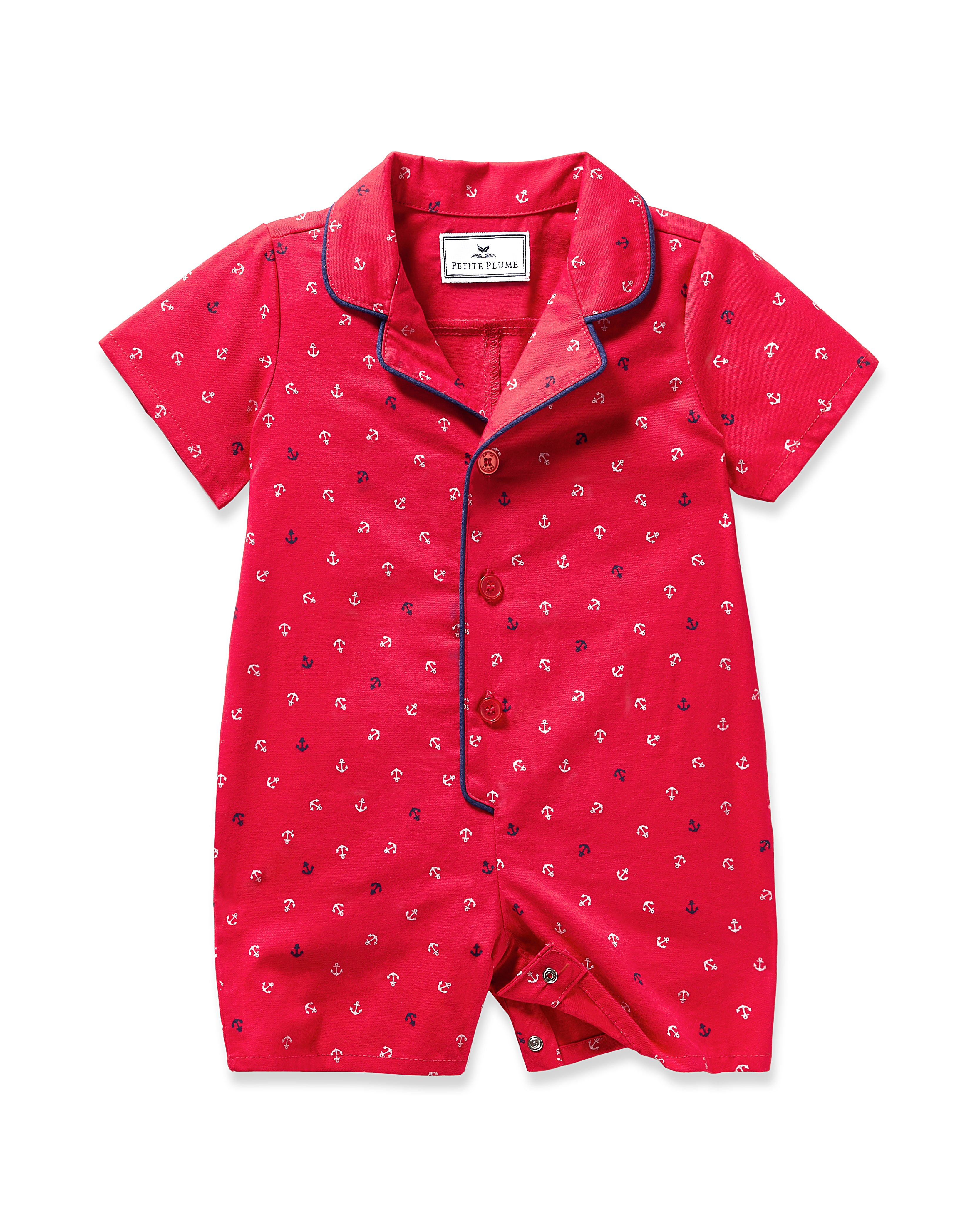 Petite Plumes Babys Twill Summer Romper in Anchors Away features a red design with short sleeves and navy piping. Made from brushed twill, it includes front buttons and a small pointed collar for a classic look.