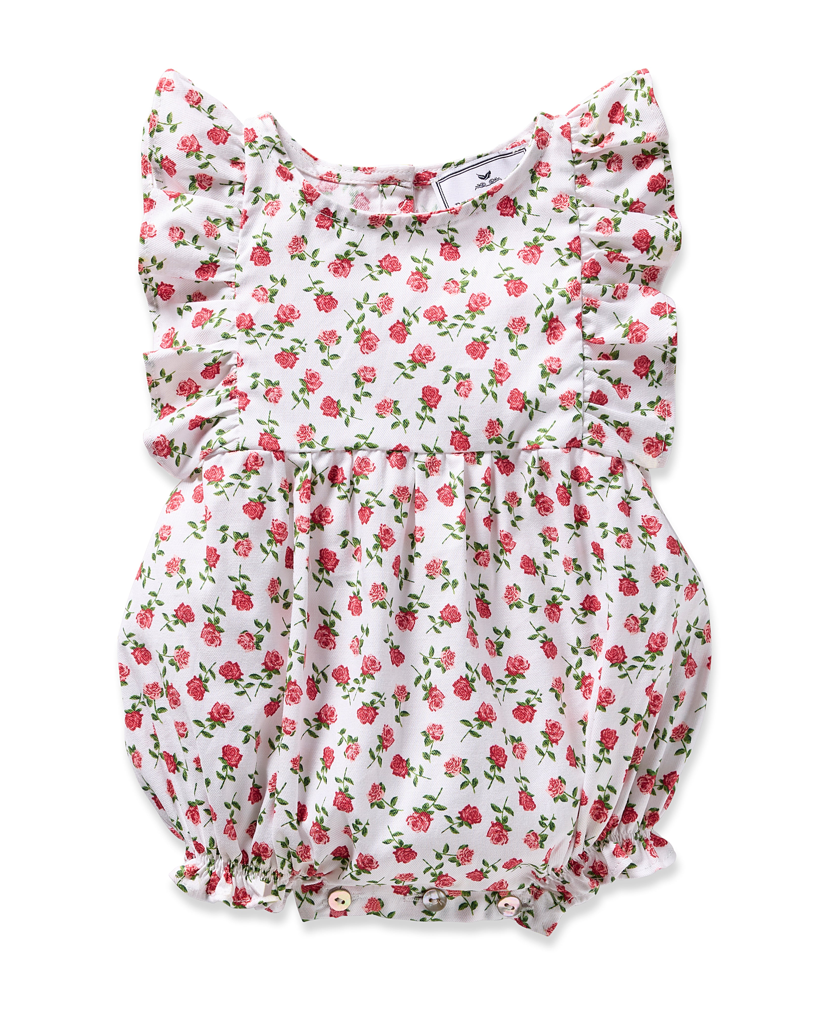 The Babys Twill Ruffled Romper in Petite Petals by Petite Plume is a white infant romper with a pink and green floral pattern, luxe yarn-dyed cotton, flutter sleeves, and ruffles. Elastic leg openings provide gathered comfort.