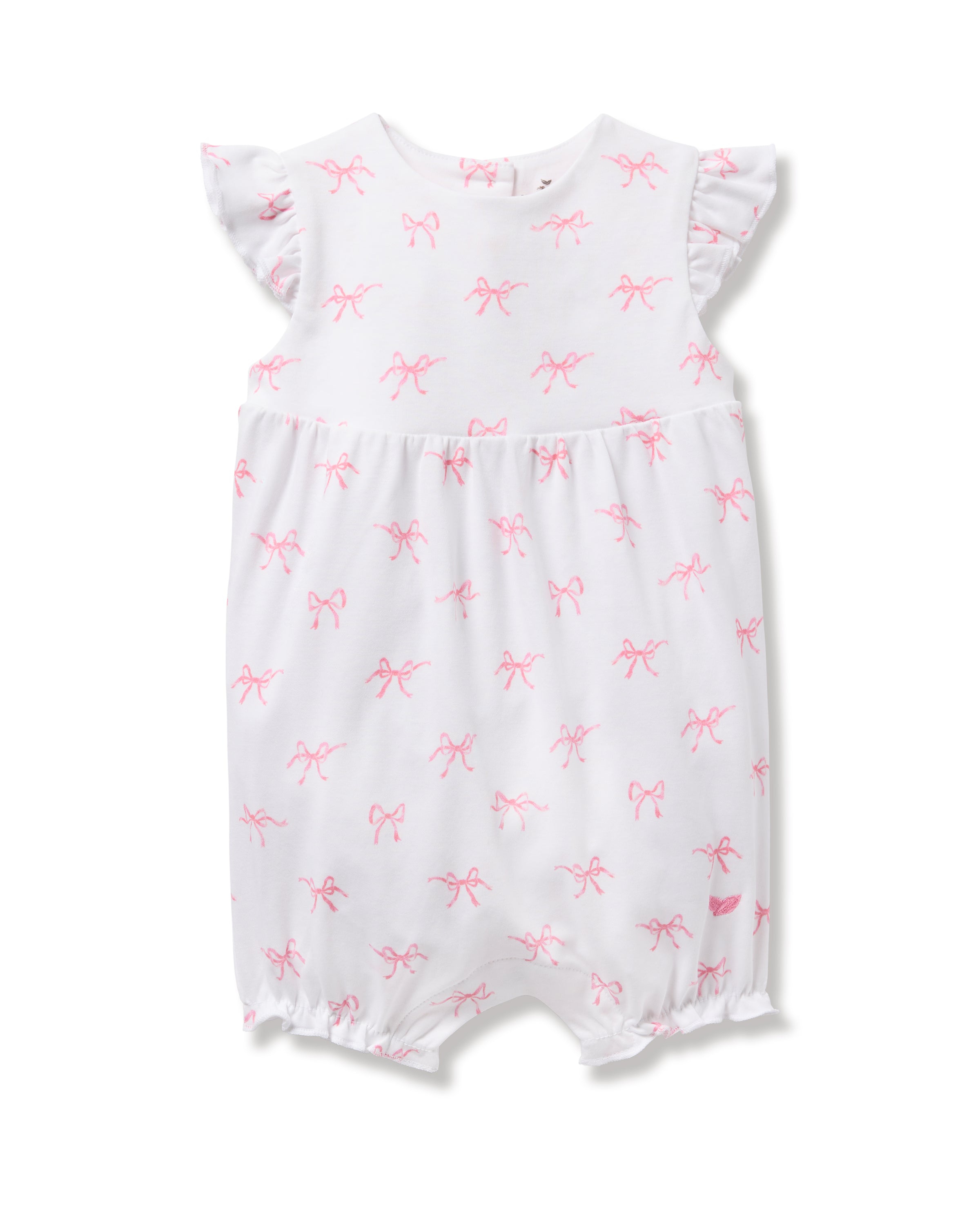 The Petite Plume Babys Pima Isla Play Romper in Blushing Bows features soft Pima cotton with white fabric and pink bow patterns, offering ruffled sleeves and a one-piece design for a cute, simple infant style.