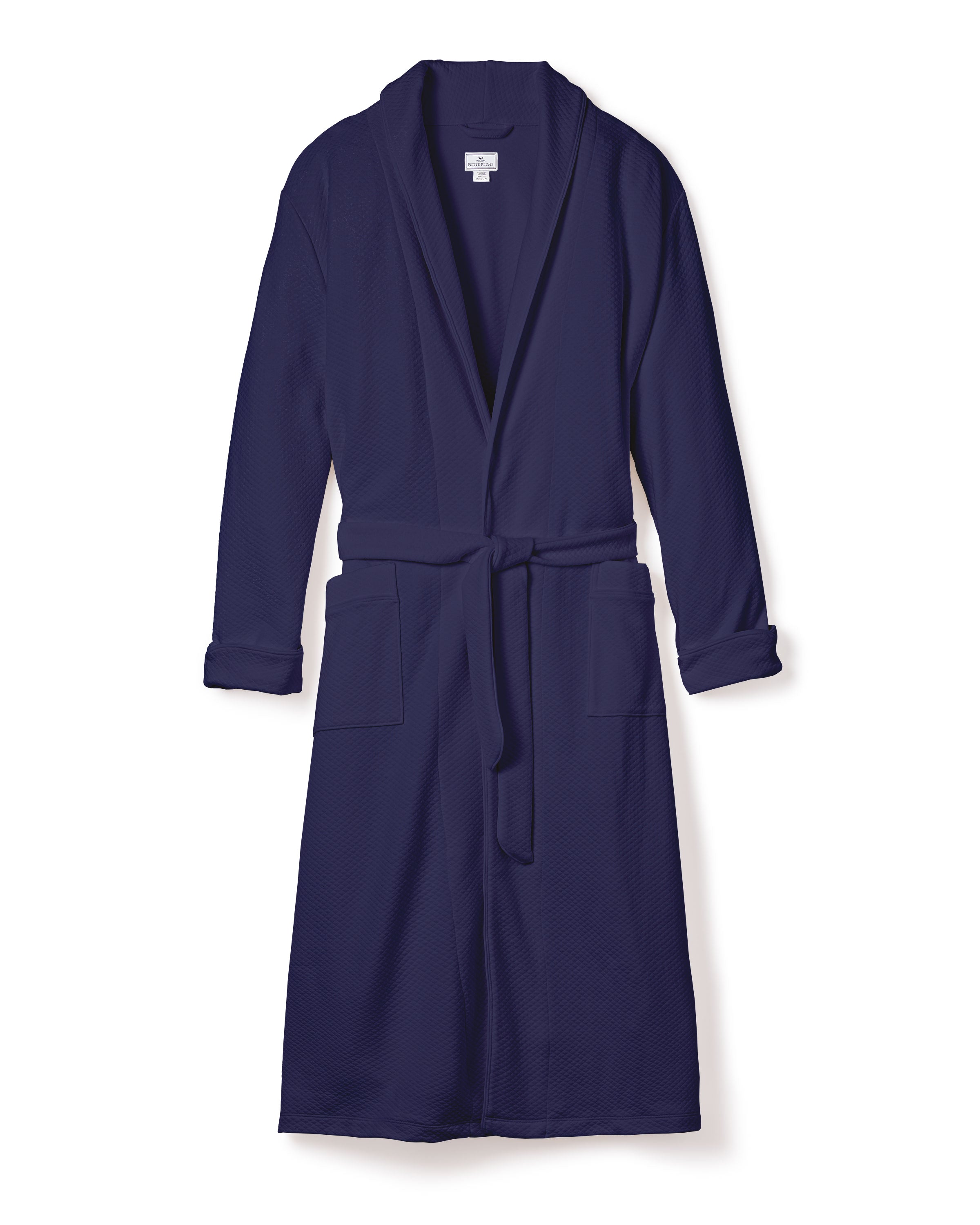 The Mens Pima Robe in Blue Dusk Jacquard by Petite Plume is a luxury garment with long sleeves, a shawl collar, tied waist belt, and two front pockets. Made from Pima cotton with a quilted effect, its perfect for unwinding. It is laid flat against a plain white background.