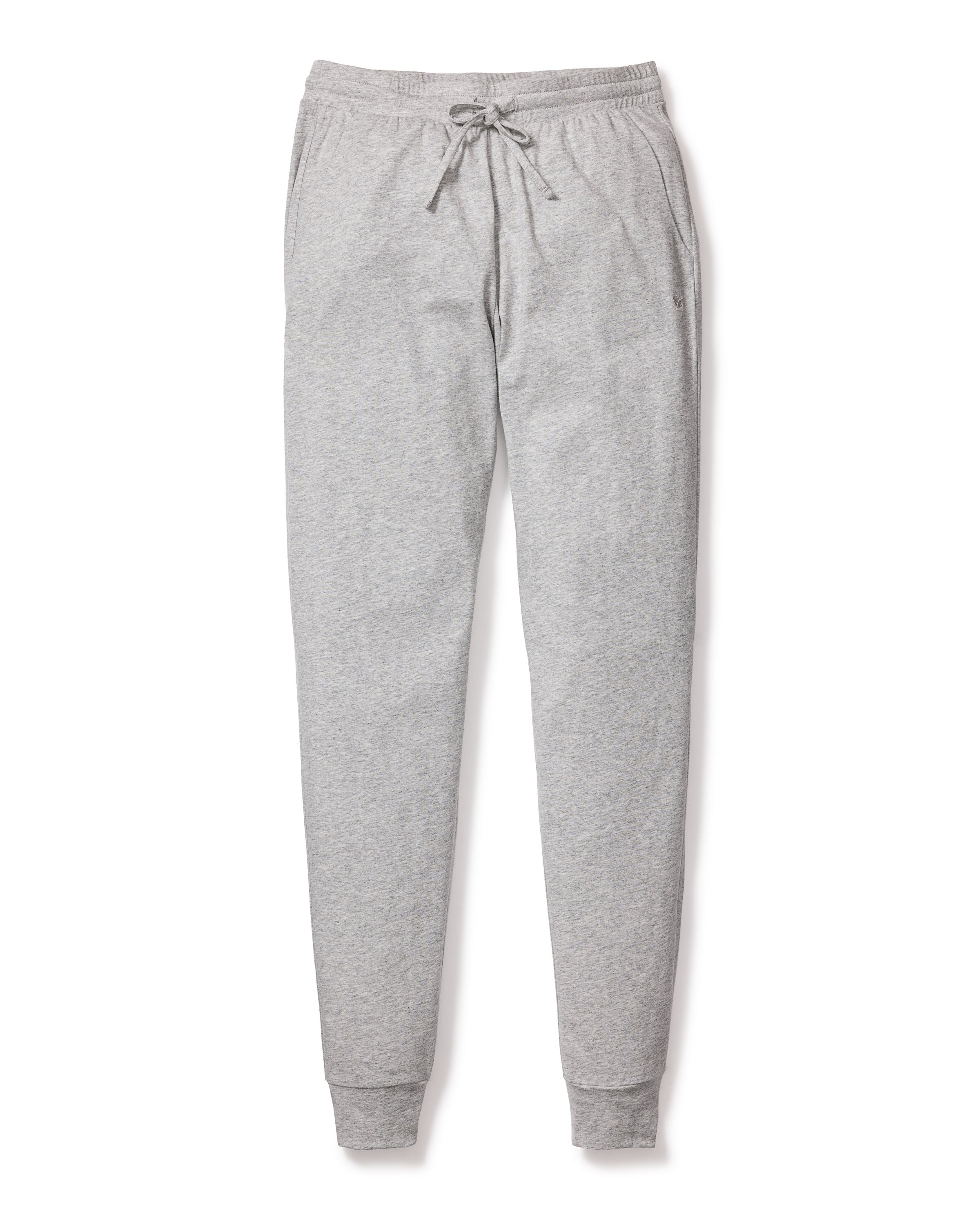 Petite Plumes Womens Pima Lounge Pants in Light Grey are made from jersey knit fabric, featuring an elastic waistband and drawstring. They have side pockets and a relaxed, tapered fit, offering the comfort of luxury sleepwear for any occasion.