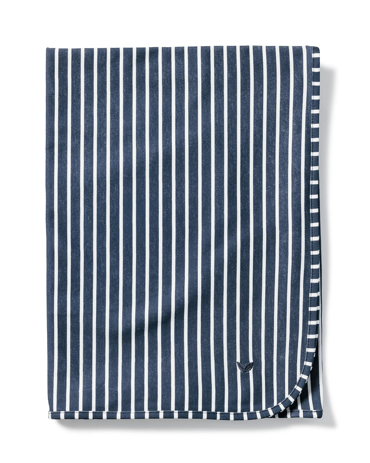 The Pima Baby Blanket in Navy Stripe from Petite Plume is neatly folded, showcasing its dark blue color with vertical white stripes and rounded edges. Made of soft Pima cotton, it features a small stylized eagle logo in the bottom right corner, adding elegance to this Maternity Collection piece.