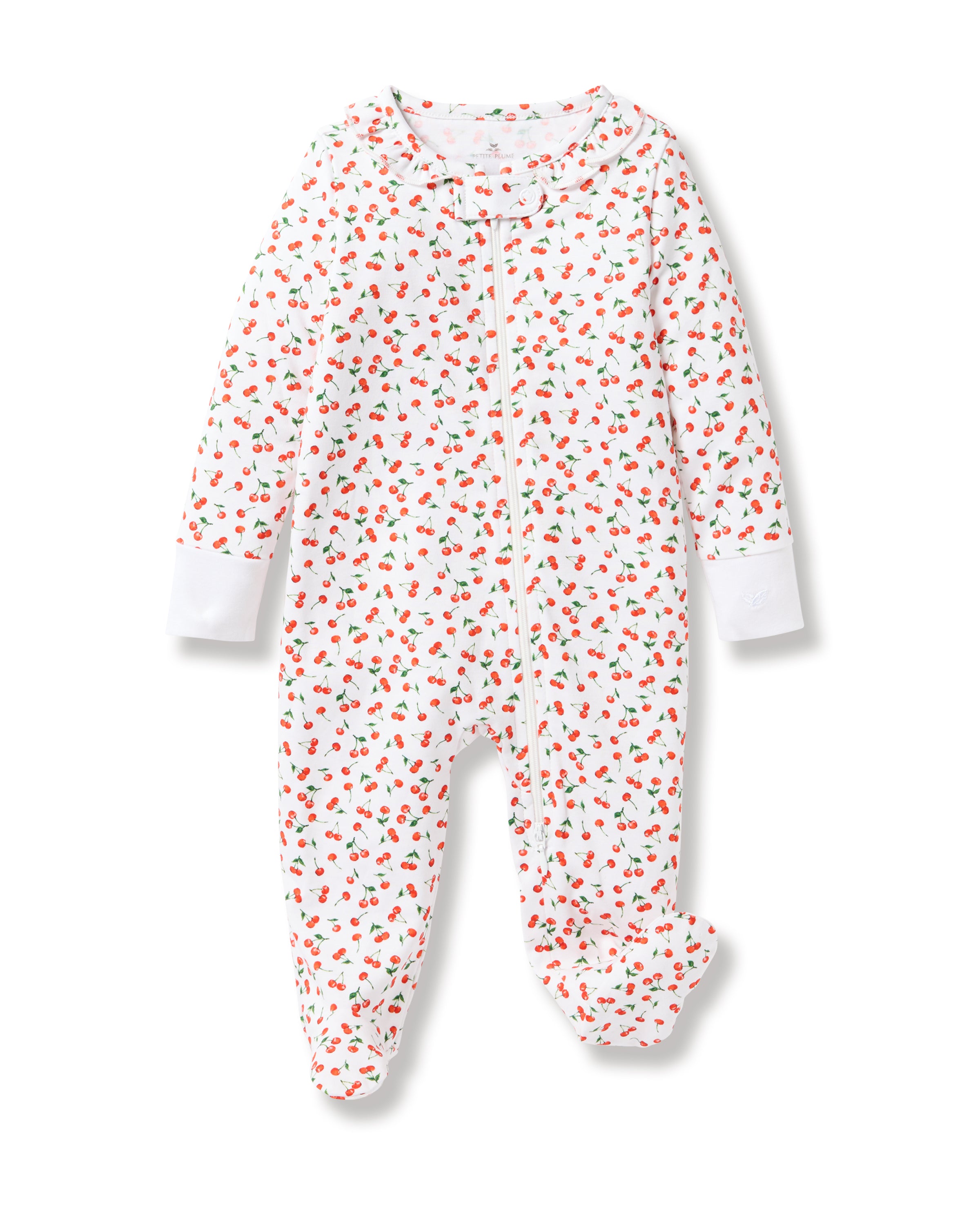 The Baby Pima Romper in Cherry Orchard by Petite Plume is a white Pima cotton onesie adorned with a vibrant print. It features long sleeves, enclosed feet, and a front zipper for added comfort and warmth.