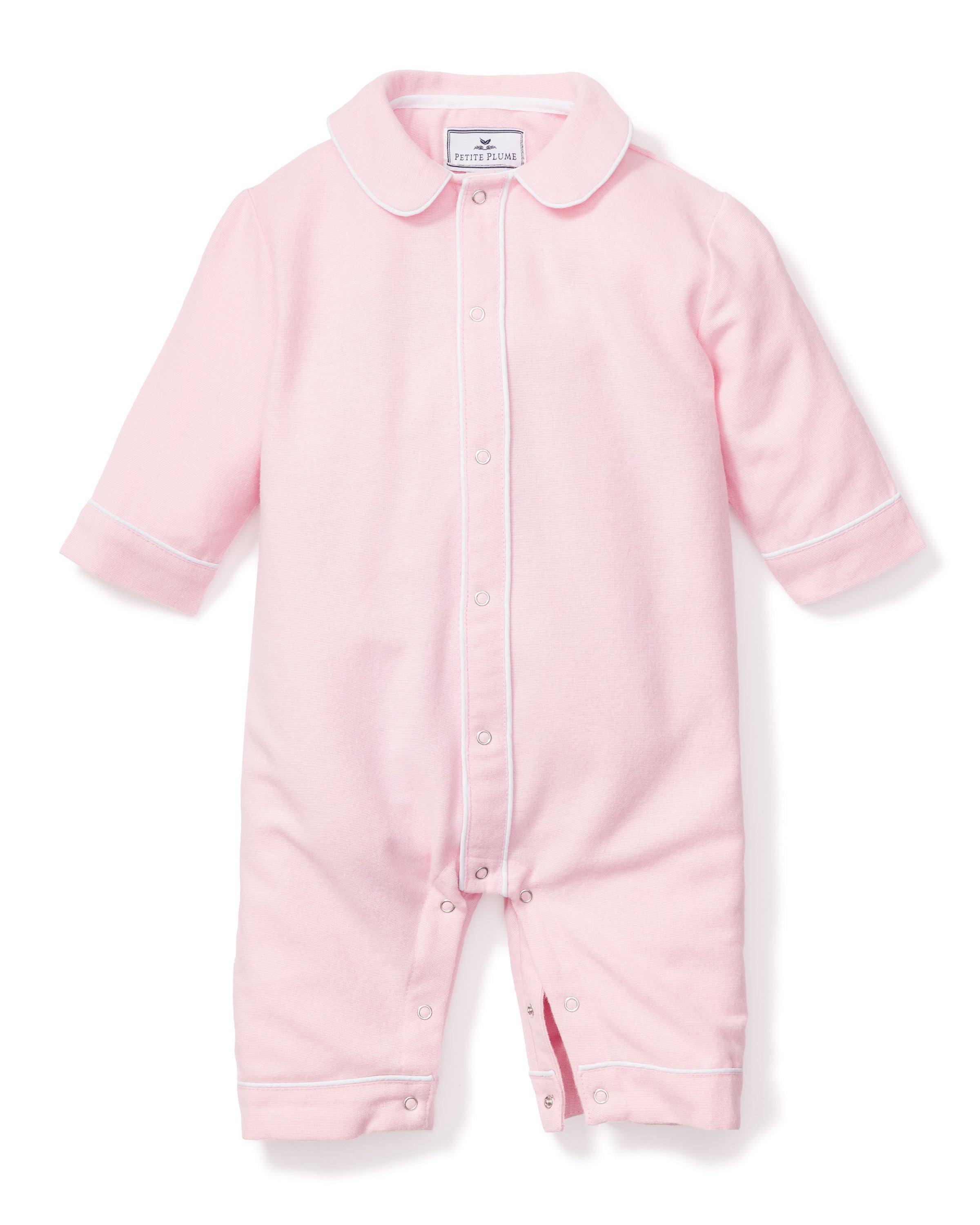 The Babys Flannel Cambridge Romper in Pink by Petite Plume is a soft brushed cotton flannel onesie with long sleeves, a Peter Pan collar, white trim on collar and cuffs, plus snap closures down the front and around the legs for convenient childrens sleepwear.