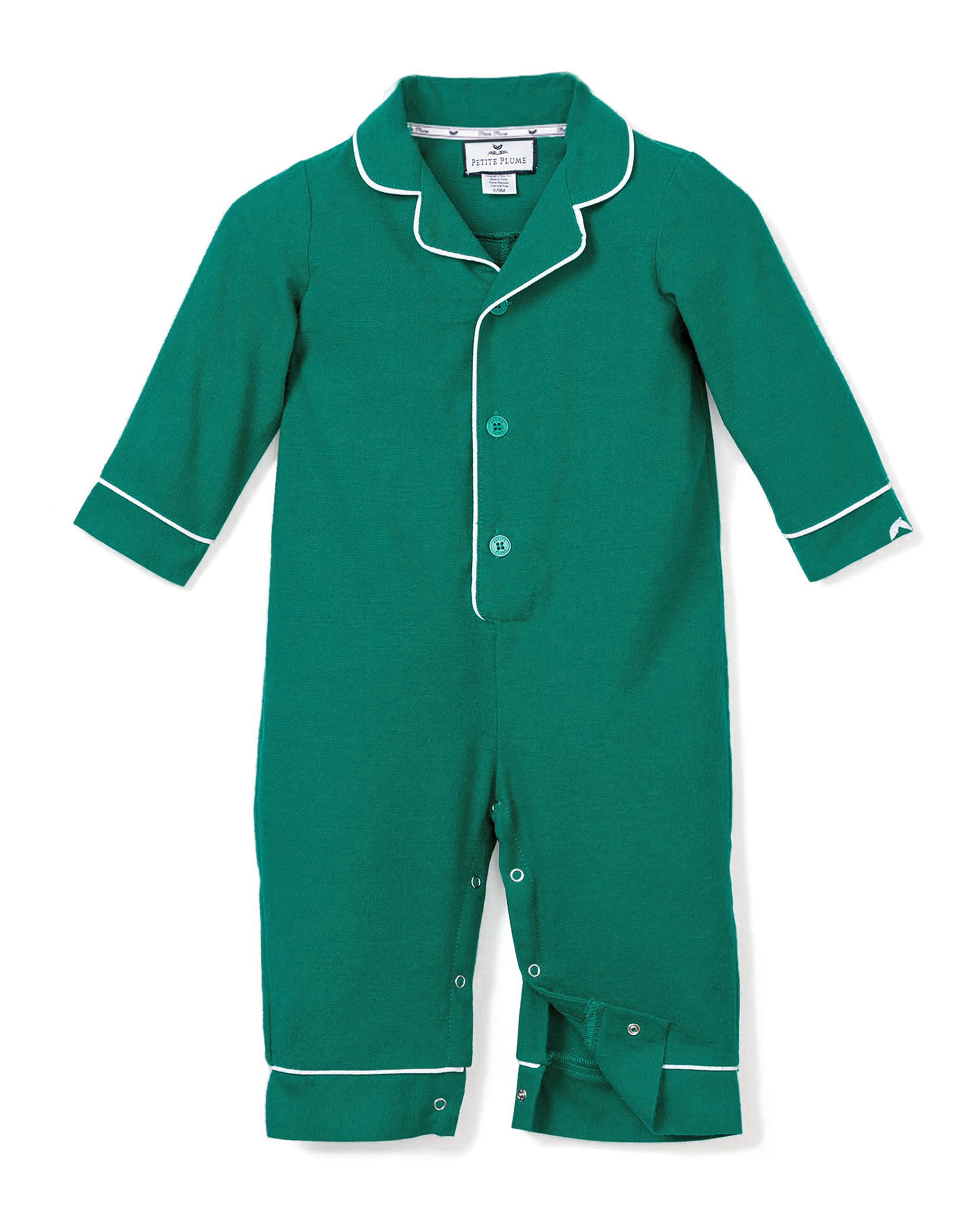 The Petite Plume Babys Flannel Romper in Forest Green with White Piping is perfect sleepwear for little ones. It has long sleeves, buttons down the front, snaps along the inner legs, and a round collar accented by matching trim.