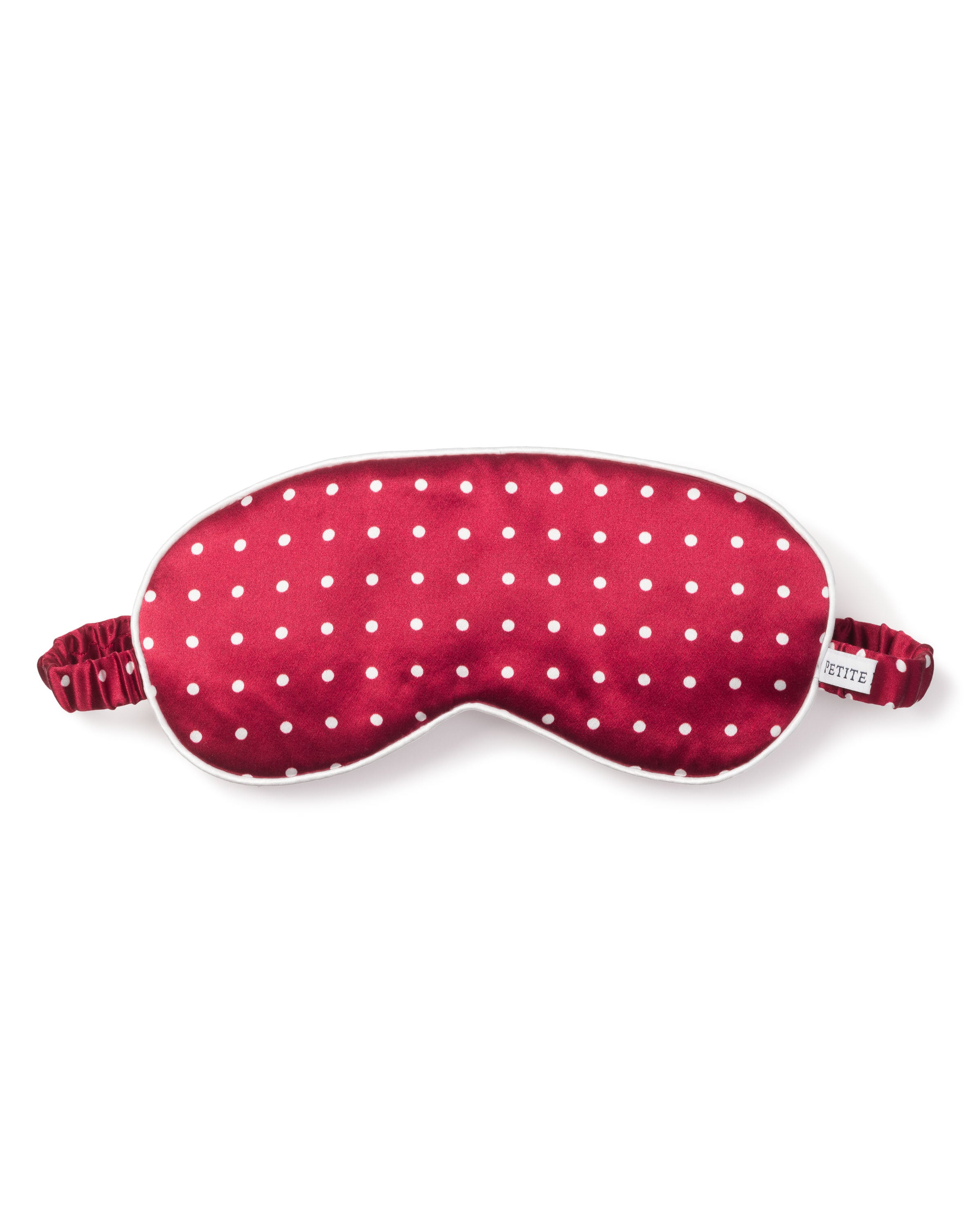 Drift into the sweetest dreams with Petite Plumes Adults Silk Sleep Mask in Bordeaux Polka Dot, featuring an elastic strap and crafted from pure silk for ultimate comfort.