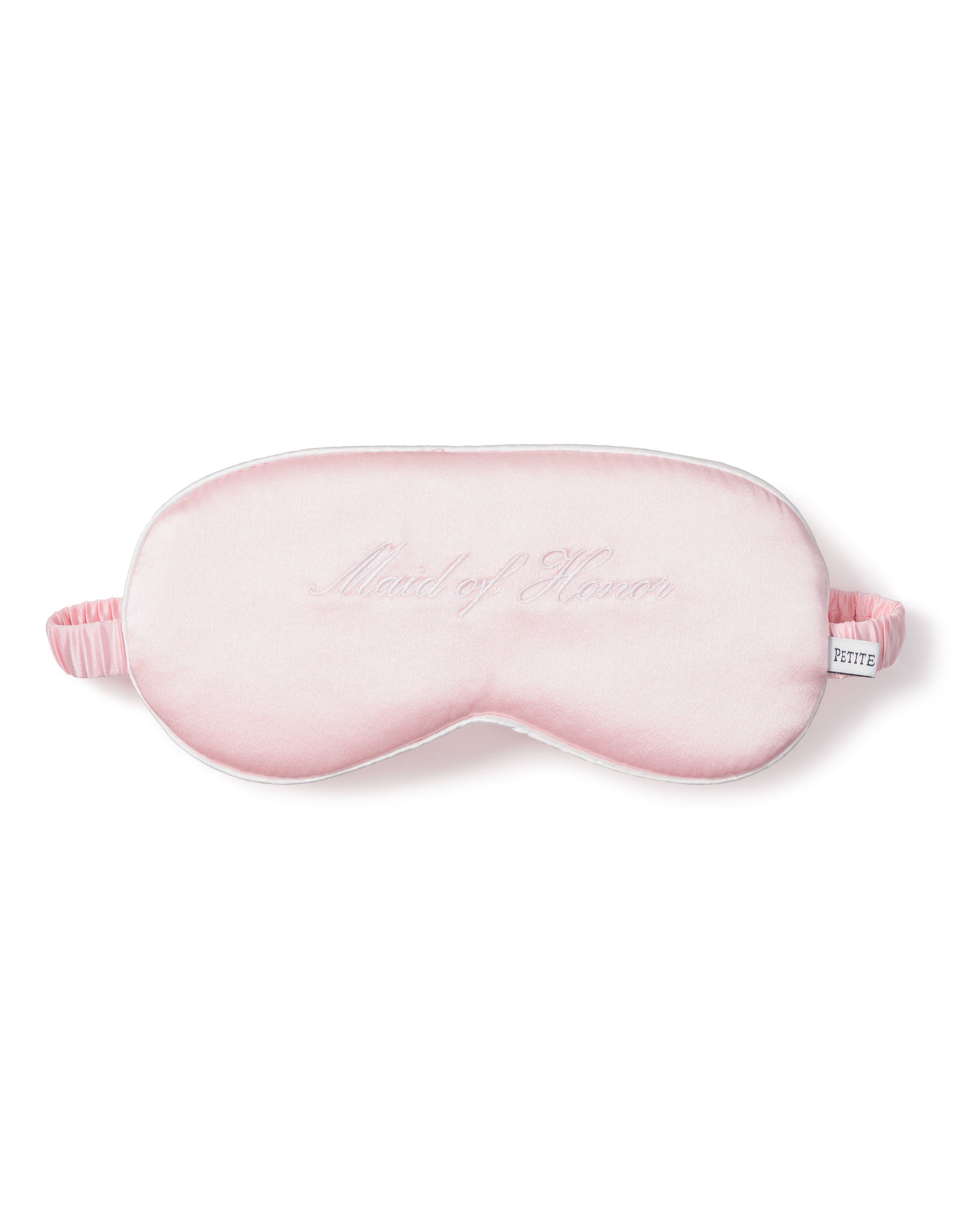 The Petite Plume Womens Silk Maid of Honor Sleep Mask is a perfect gift; its pink hue, Maid of Honor embroidery, elastic strap, and soft texture invite blissful sleep.