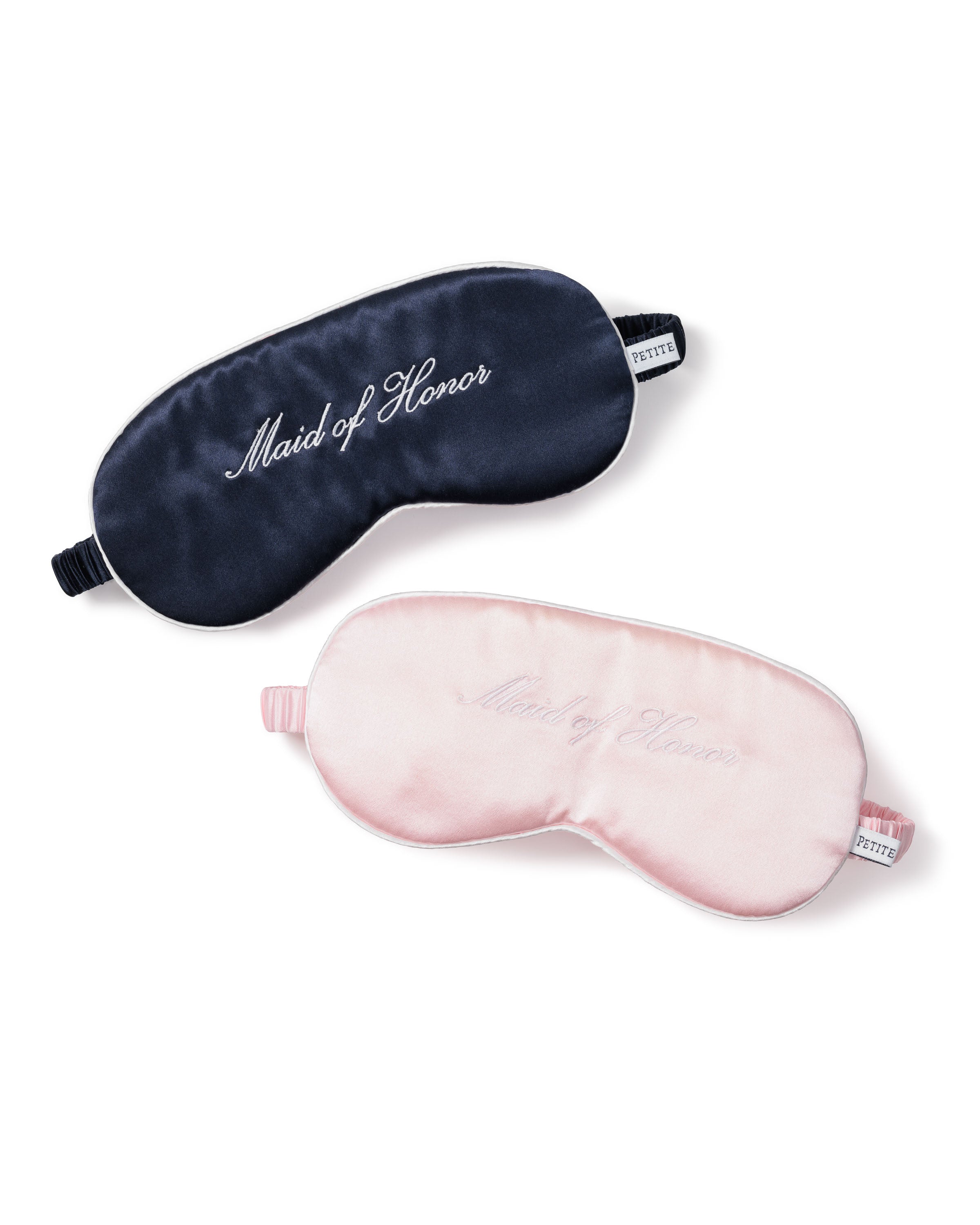 The Petite Plume Womens Silk Maid of Honor Sleep Masks in dark blue and light pink, with adjustable straps and embroidered text, are the perfect gift to ensure comfort as they whisk you away to dreamland.