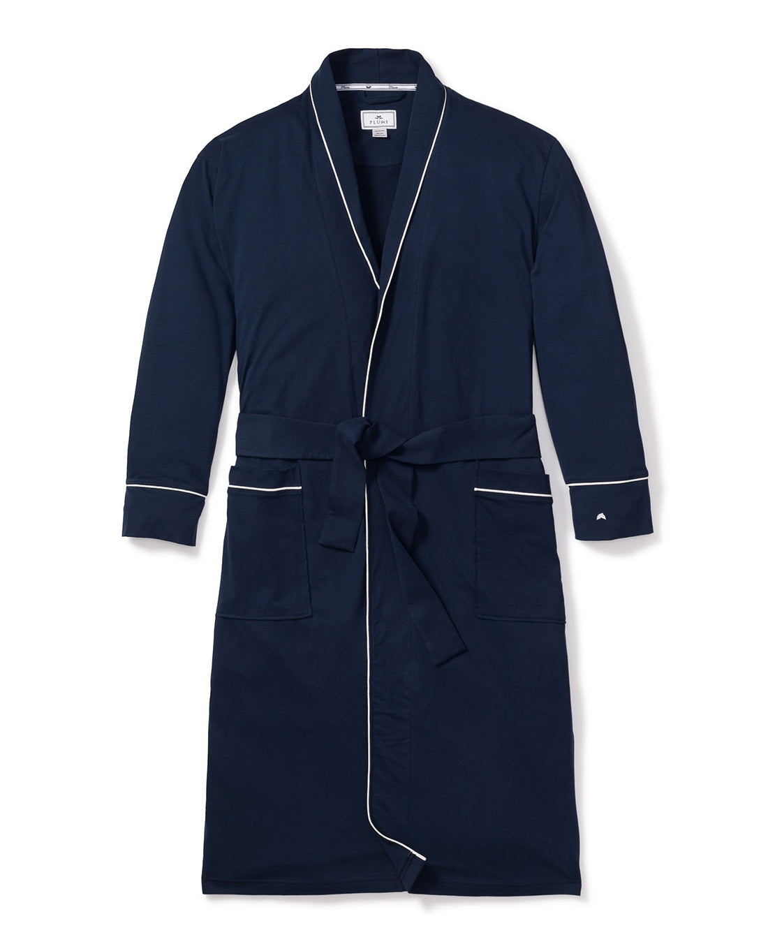 The Mens Pima Robe in Navy by Petite Plume features long sleeves, white piping, a waist tie belt, and two front pockets. Made from luxurious Peruvian Pima cotton, it offers a soft and comfortable feel that complements your collection of luxury pajamas.